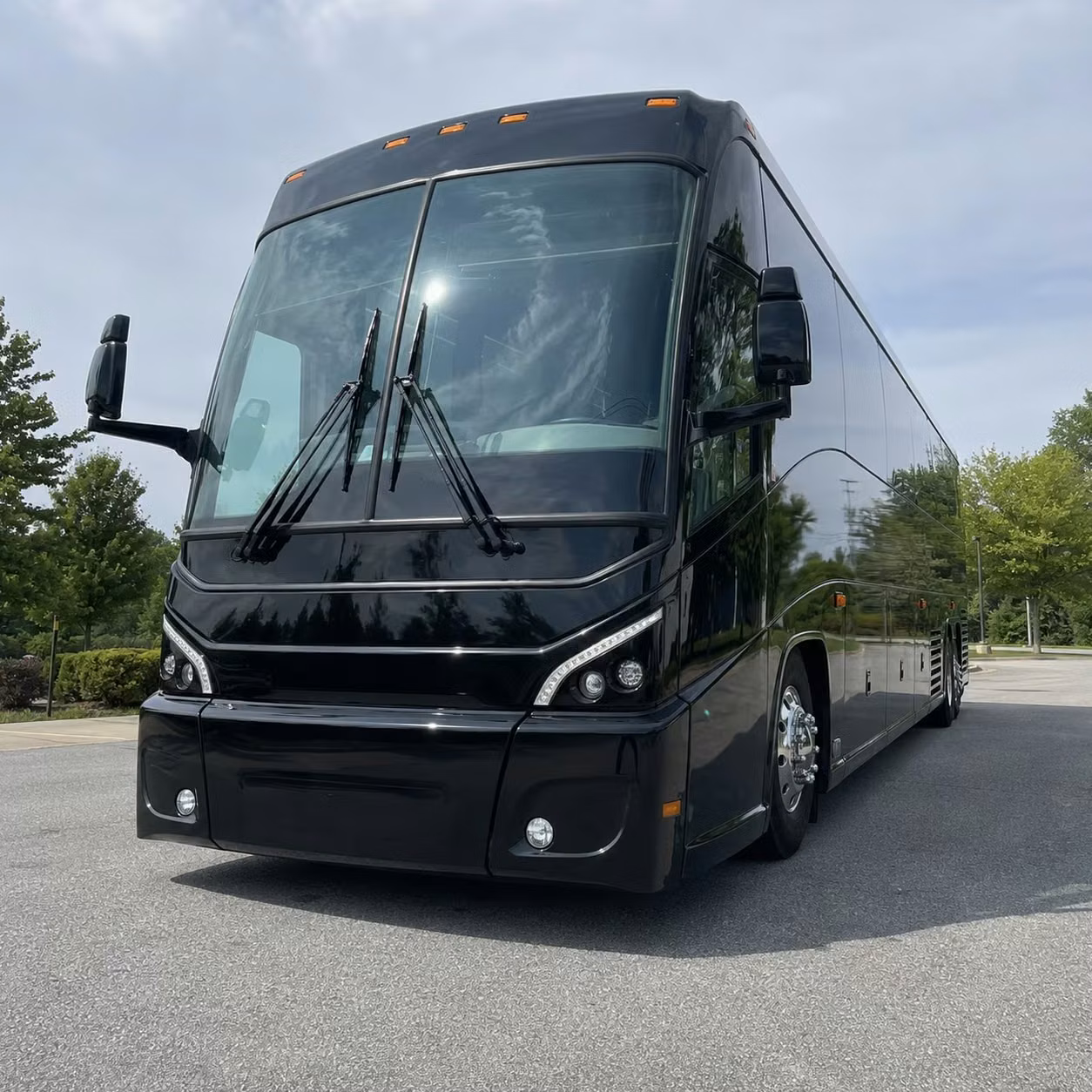 paramount 56 passenger charter bus rental